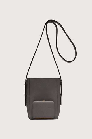 front profile Parker S Cross Body Bag Asphalt  Long Strap leather grey bag with adjustable strap and exterior pocket 