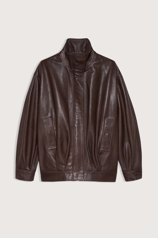 flat lay Paula Vegetal Leather Jacket coffee bean brown Oversized jacket
High collar
hidden zipper closure
Relaxed yet structured silhouette
100% Sheep Leather