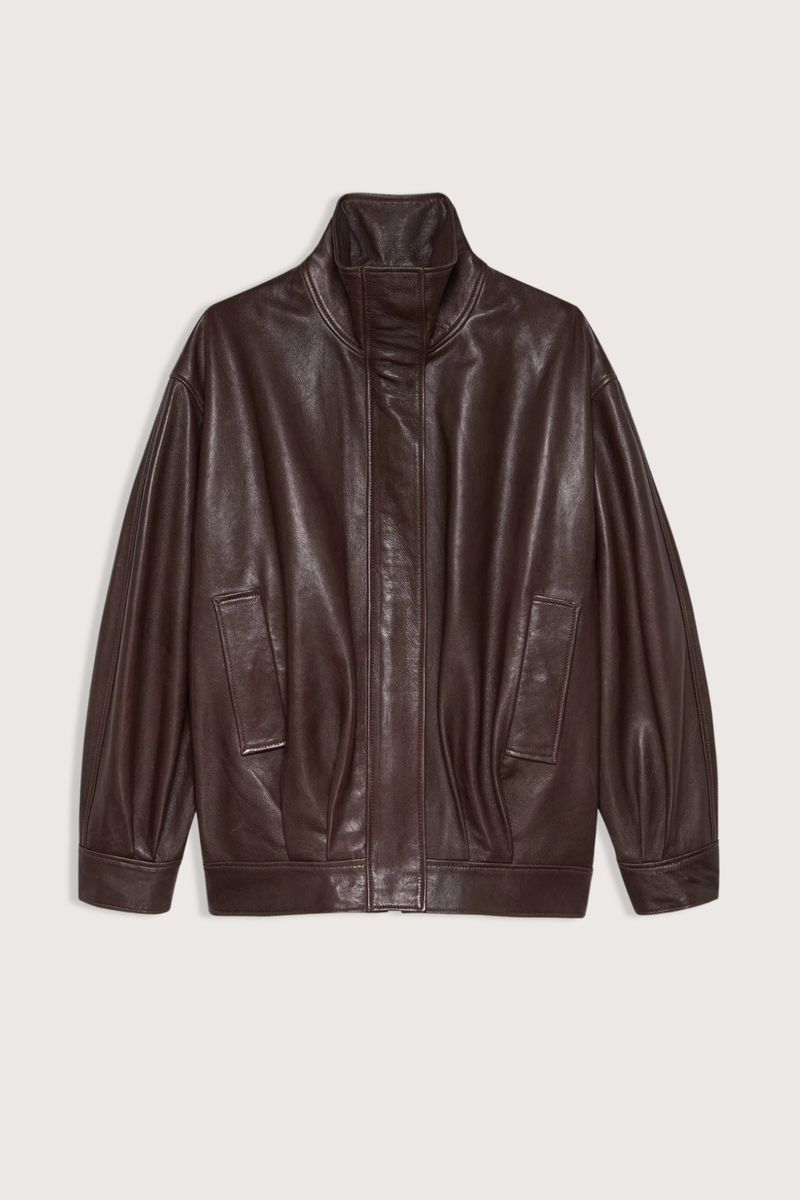 flat lay Paula Vegetal Leather Jacket coffee bean brown Oversized jacket
High collar
hidden zipper closure
Relaxed yet structured silhouette
100% Sheep Leather