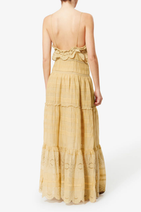 back profile model wearing Paule Cami Maxi Dress Light Ocher Long cotton and floral lace dress
Low-cut V-neckline
Thin adjustable straps
Buttoned front
Frills with a crochet finish and pintucks
Lined
Flared cut
100% cotton