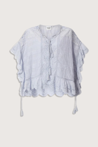 flat lay Payton Top Light Blue Caftan style organic cotton and floral lace top
Round collar with tie strings
Broderie anglaise and pintucks
Short frilly sleeves
Side frills and drawstrings
Flared cut
100% cotton