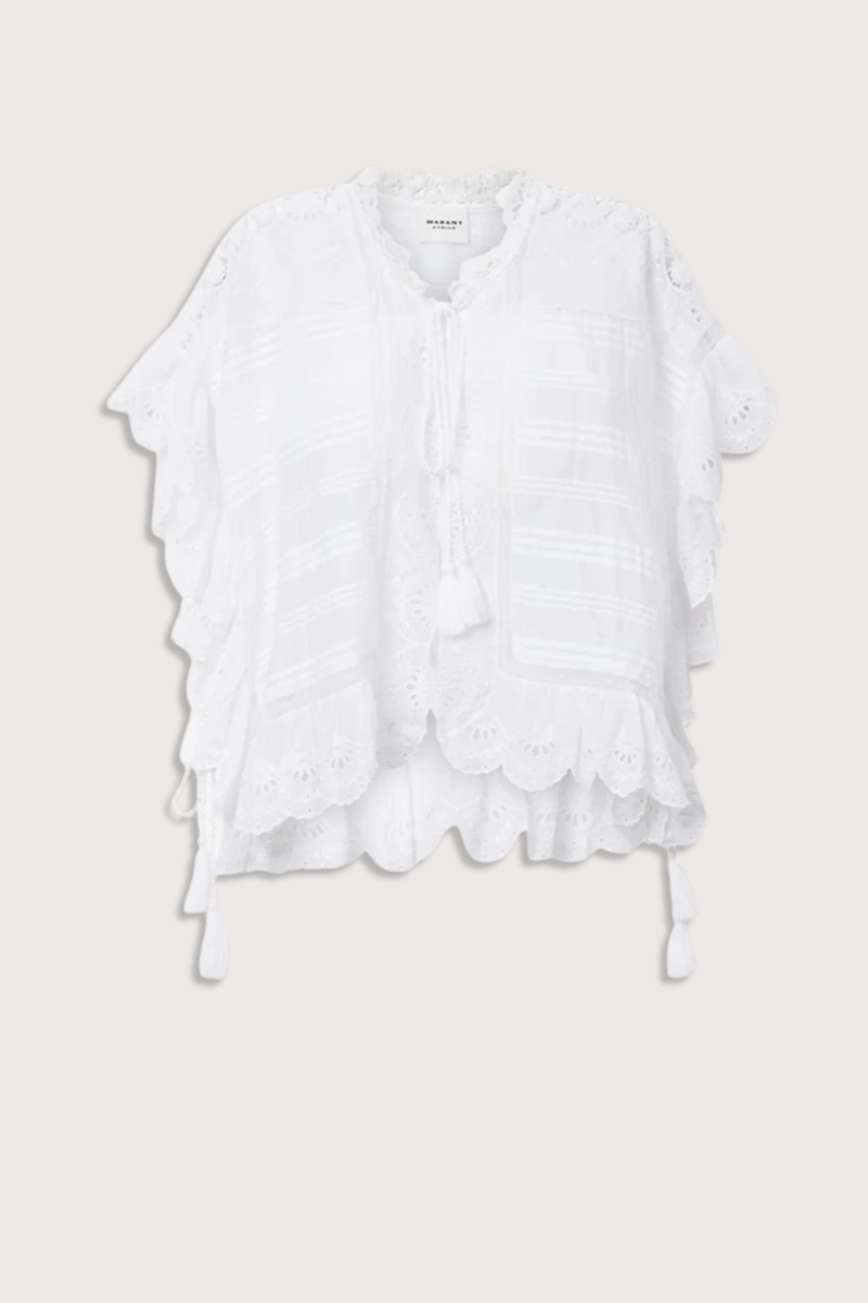 flat lay Payton Top White Caftan style organic cotton and floral lace top
Round collar with tie strings
Broderie anglaise and pintucks
Short frilly sleeves
Side frills and drawstrings
Flared cut
100% cotton