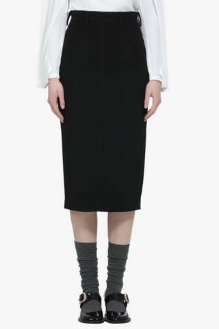 front profile model wearing Pencil Skirt black calf length Center seams at the front and back
Belt loops