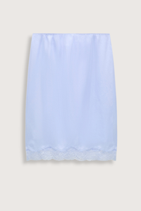 flat lay Playful Volumes Skirt Icy Sky blue Lingerie-inspired skirt

Scalloped lace trim around the hemline
100 % Silk
Double layer silk Habotai lingerie-style skirt
Lace hem with scalloped edge
Silk Habotai lining with lace detail