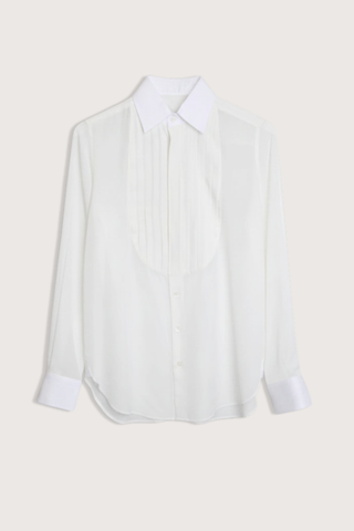 flat lay Pleated Bunny Shirt ecru Playful take on a classic smoking shirt
Band collar
Curved bib
Wide pleating
Mother of pearl buttons
Straight cut - classic
Rounded cuff
100% silk