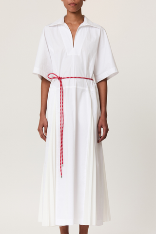 front profile model wearing  Pleated Poplin Dress With Red Belt white popeline long shirt dress
V-neck
Belt included