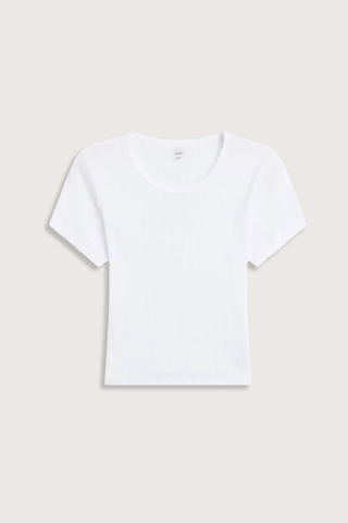flat lay Pointelle Baby Tee White slim fit
Cropped length
Cap-style sleeve
Classic crew neckline
Signature pinhole stripes
Delicate eyelets
Scalloped edging
100% Cotton