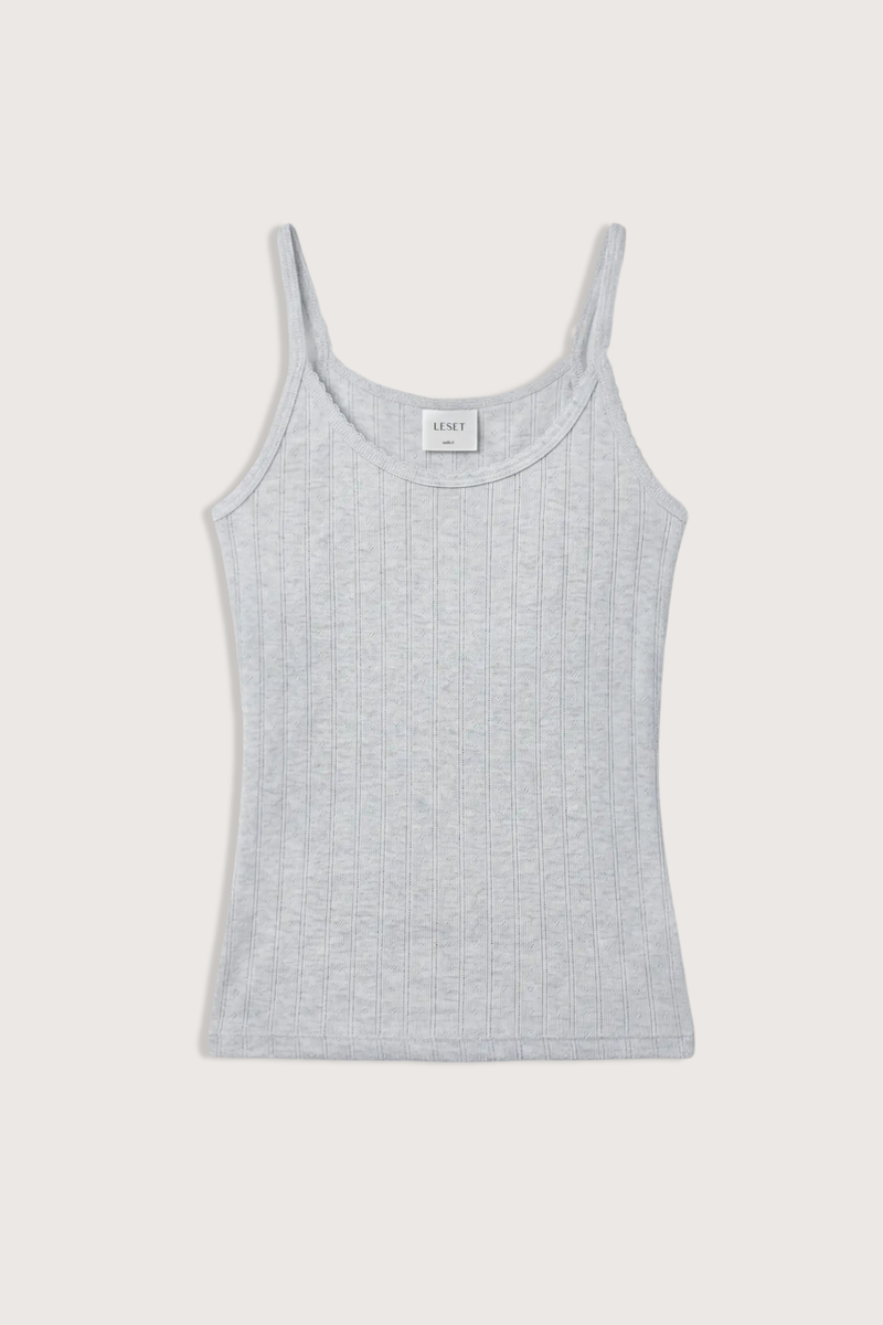 flat lay Pointelle Cami Light Grey Melange Pointelle Tank
Classic spaghetti strap silhouette
Signature pinhole stripes
Dainty eyelets
Scalloped edging
100% Cotton