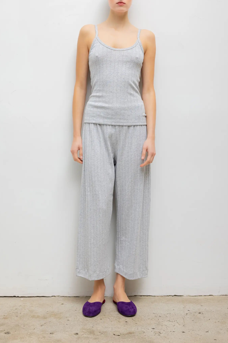 front profile model wearing Pointelle Cami Light Grey Melange Pointelle Tank
Classic spaghetti strap silhouette
Signature pinhole stripes
Dainty eyelets
Scalloped edging
100% Cotton