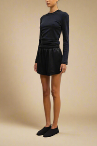 side profile model wearing Pointelle Slim Fit Long Sleeve Black cotton crewneck
