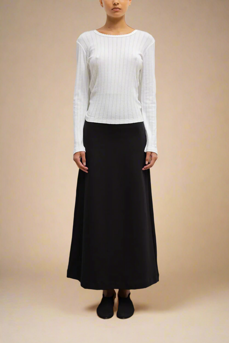 front profile model wearing Pointelle Slim Fit Long Sleeve White cotton crewneck