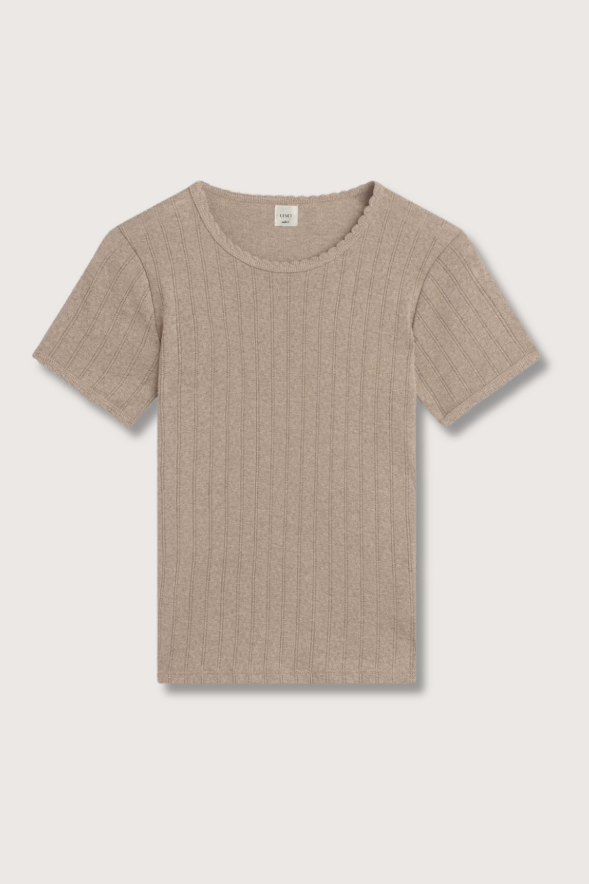 flat lay Pointelle Slim Fit Tee Beige cotton Classic lingerie inspired details
Pinhole stripes
Eyelets
Scalloped edges
100% Cotton