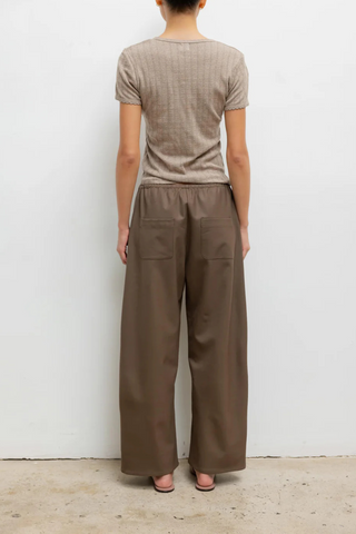 back profile model wearing Pointelle Slim Fit Tee Beige cotton Classic lingerie inspired details
Pinhole stripes
Eyelets
Scalloped edges
100% Cotton