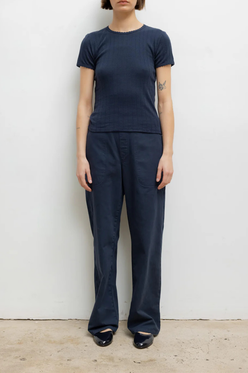 front profile model wearing Pointelle Slim Fit Tee Midnight blue cotton