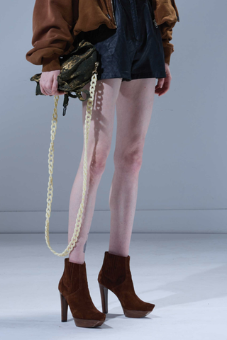 model wearing Pointy Toe Platform Heel brown suede upper pull on style