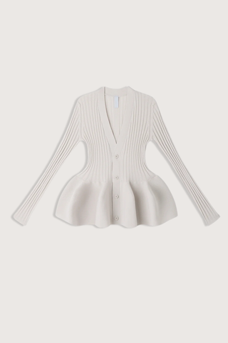 flat lay Pottery Long Sleeve Cardigan Beige Voluminous, three-dimensional flare
Form-fitting
Seamless
Button front closure
100% Polyester (Recycled Polyester)