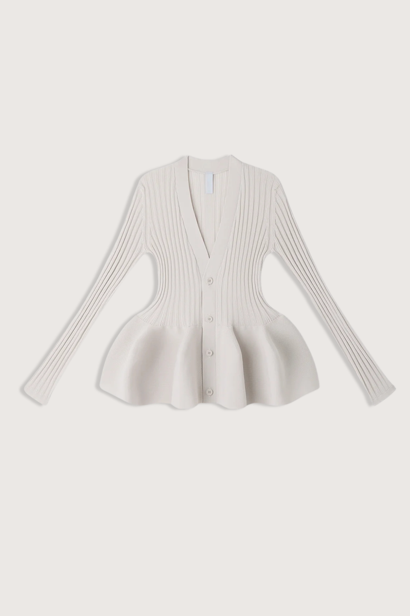 flat lay Pottery Long Sleeve Cardigan Beige Voluminous, three-dimensional flare
Form-fitting
Seamless
Button front closure
100% Polyester (Recycled Polyester)