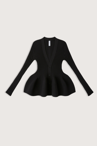 flat lay front Pottery Long Sleeve Cardigan Black Voluminous, three-dimensional flare
Form-fitting
Seamless
Button front closure
100% Polyester (Recycled Polyester)