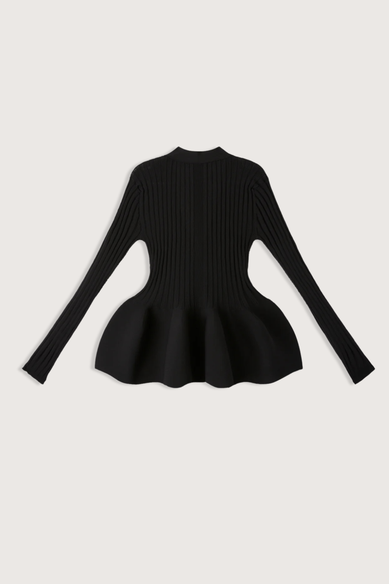 flat lay back Pottery Long Sleeve Cardigan Black Voluminous, three-dimensional flare
Form-fitting
Seamless
Button front closure
100% Polyester (Recycled Polyester)