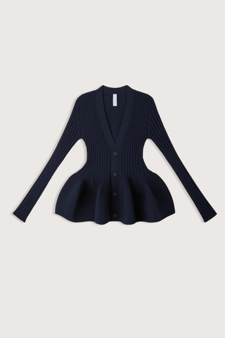 flat lay Pottery Long Sleeve Cardigan Navy Voluminous, three-dimensional flare
Form-fitting
Seamless
Button front closure
100% Polyester (Recycled Polyester)