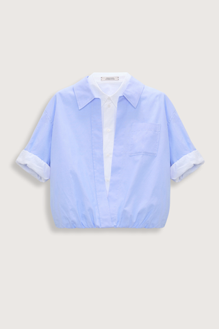 flat lay Powerful Ease Blouse oxford blue white 100 % Cotton
Full double-layer cropped blouson blouse with half sleeves
First layer in white stretch poplin, top layer in light blue oxford
First layer has a hidden placket
Top layer with chest pocket and without buttons
Turn up cuffs
Elastic hem
