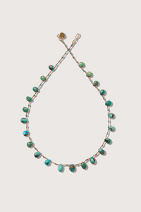 flat lay Powhatan Turquoise Necklace with 14K Gold-filled 'Infinity' Clasp