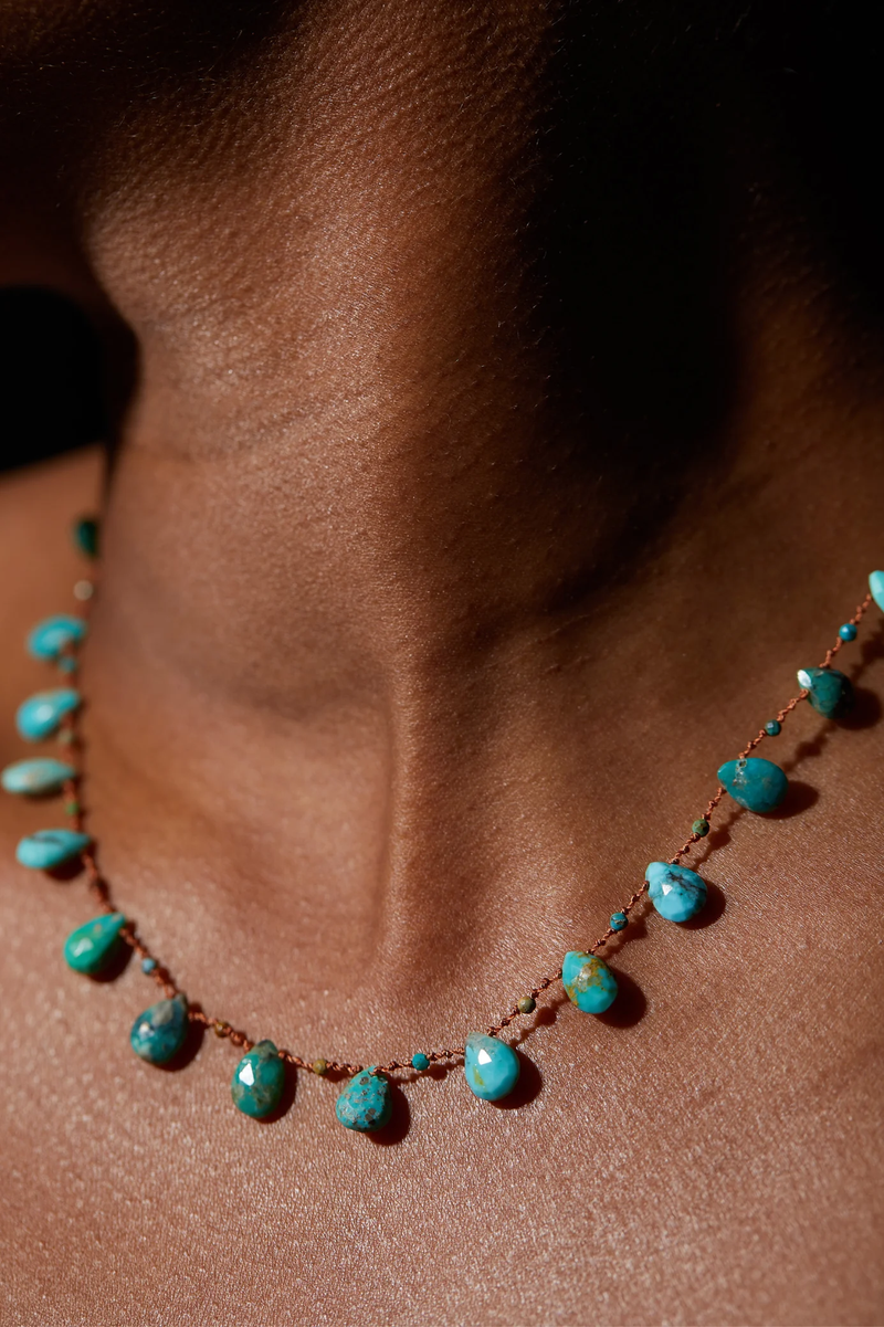 model wearing Powhatan Turquoise Necklace with 14K Gold-filled 'Infinity' Clasp