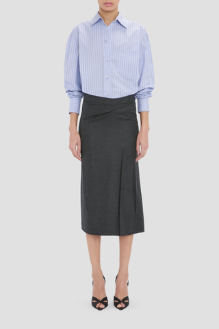 front profile model wearing Pressed Tailored Flannel Skirt Dark Grey Melange Pressed tailored
Midi skirt
Blend of wool and mohair for a textured finish
Structured fit-and-flare silhouette
Mid rise
Skirt lining
73% Virgin Wool 27% Mohair
