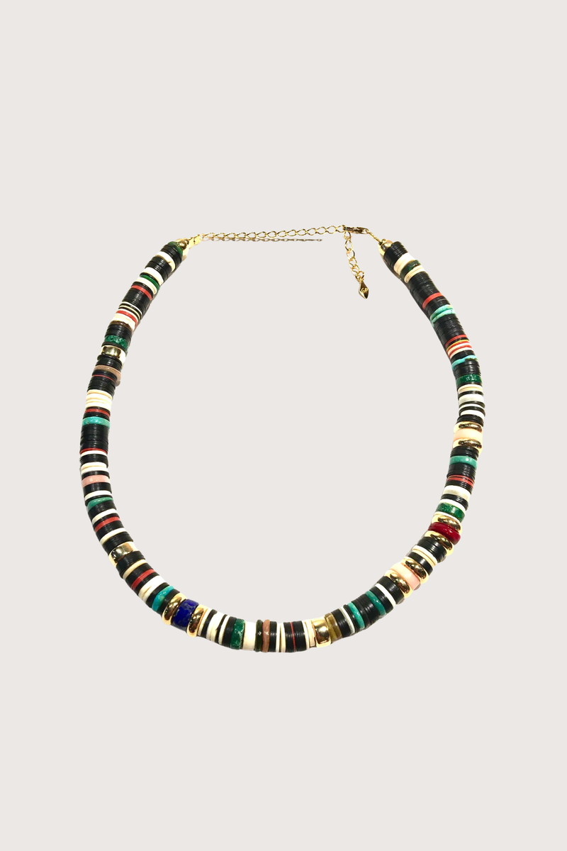flat lay Puka 14 Necklace Bakelite short necklace
Shell
Nacre and bamboo stones
Gold-plated 18K

Each piece is one of a kind

Length: 16"- 18" - adjustable