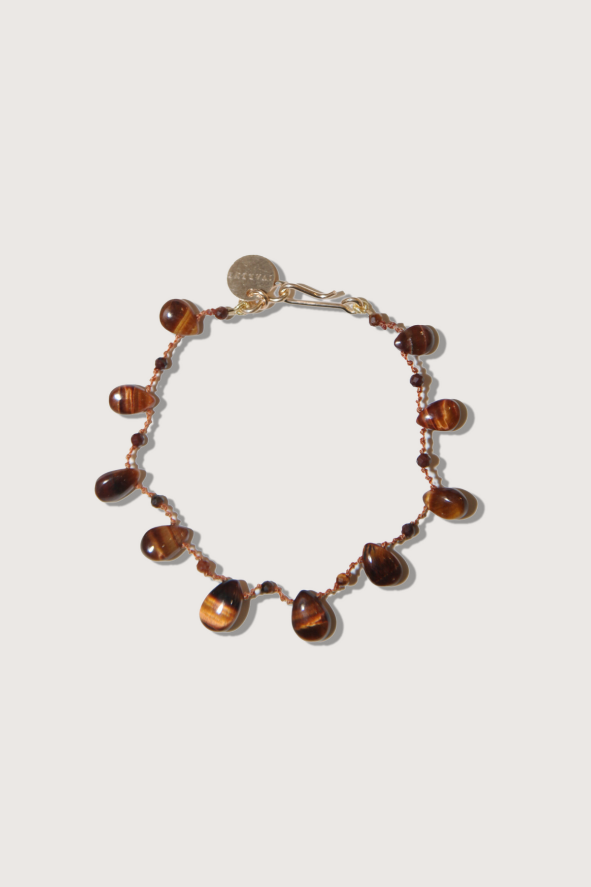 flat lay Red Willetta Bracelet - infinity 14K gold-filled gold clasp