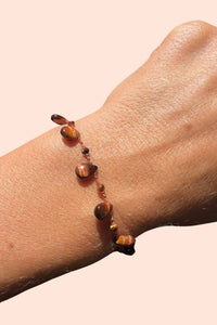 model wearing Red Willetta Bracelet - infinity 14K gold-filled gold clasp