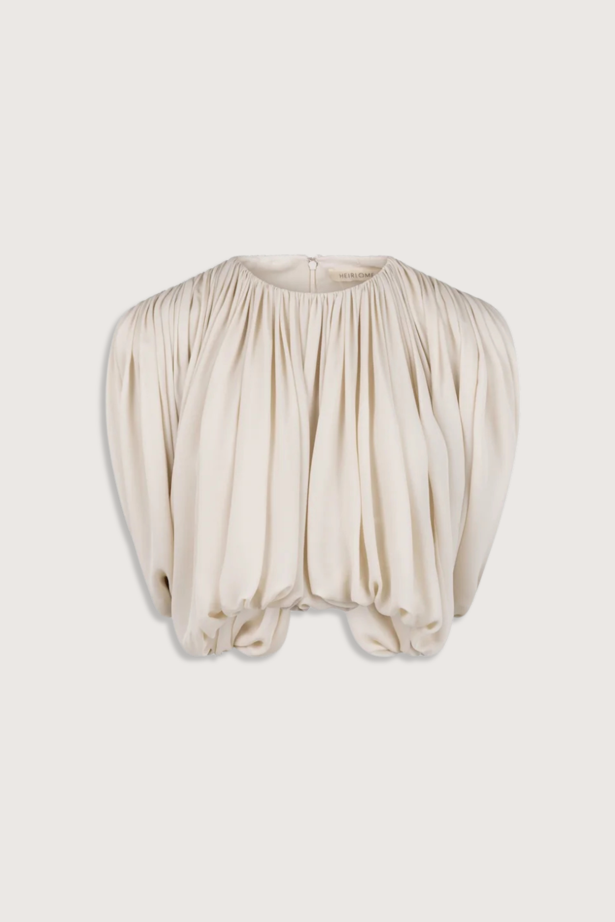 flat lay Renata Top Open Back Ecru silk Shirred, draped top
Draped in a single piece from front to back around the armhole
Classic crew neckline
Structured shoulder pads