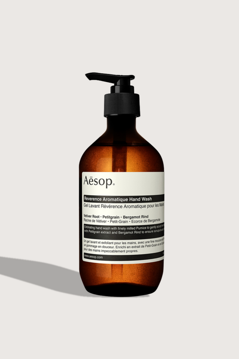 flat lay Reverence Hand Wash 500mL brown bottle with pump