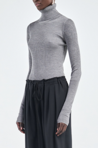side profile model wearing Ribbed Turtleneck Heather Grey long sleeve slim fit merino wool