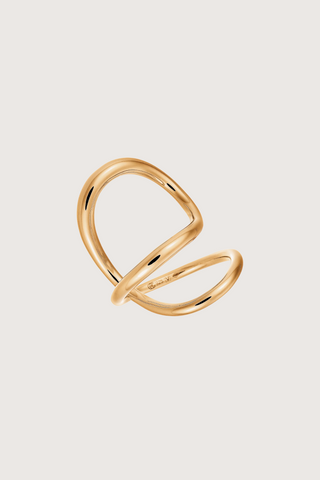 flat lay Ribbon Ring Vermeil 925 Silver covered with 18 carat gold (Vermeil 5 microns) Climbs and snakes, landing and curving around the finger in unconventional ways