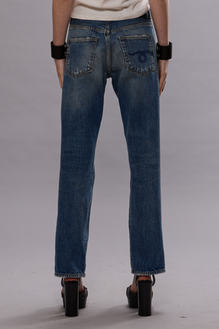 back profile model wearing Romeo Jean Hutton Blue wash slim boyfriend fit