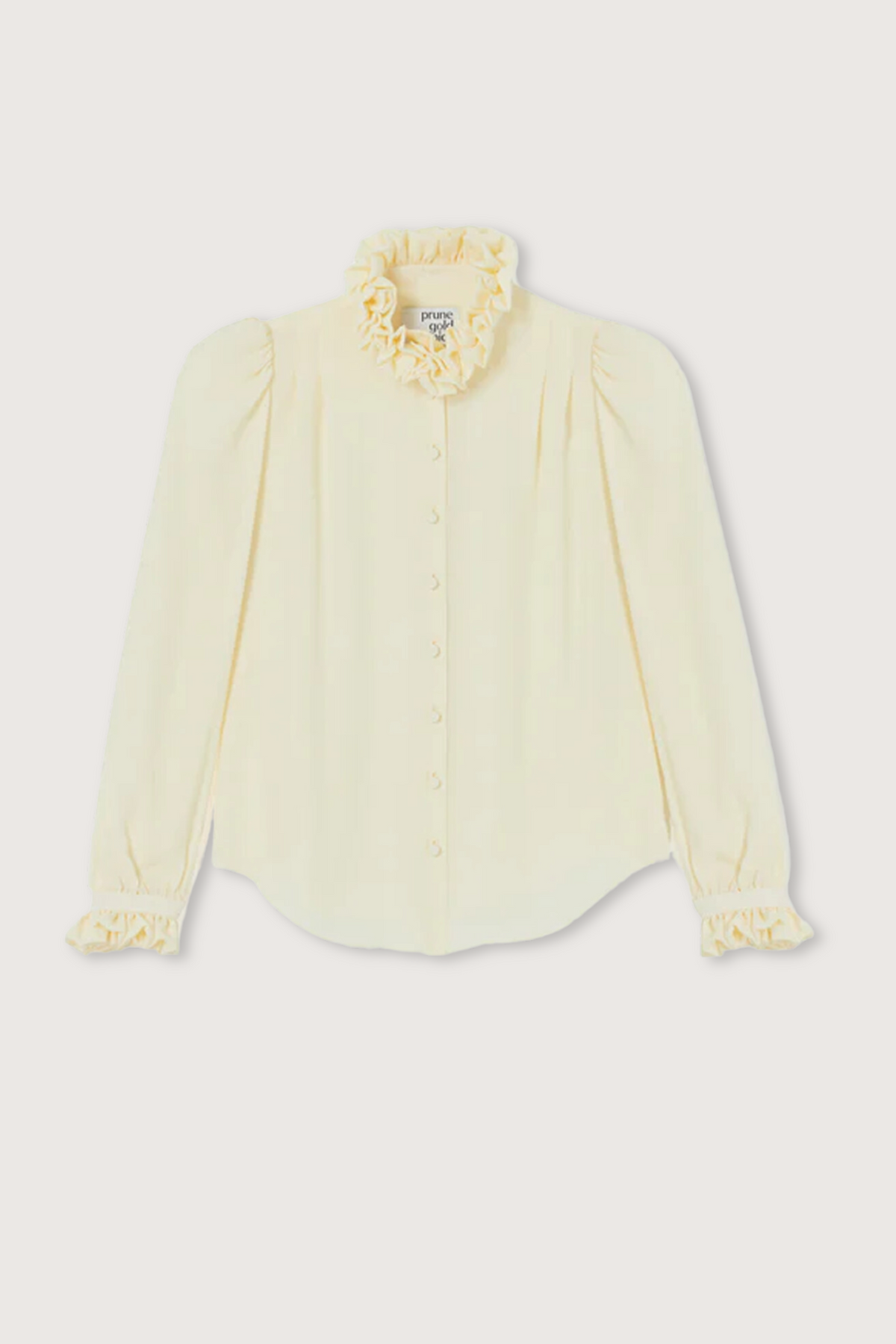 flat lay Rosanna Silk Shirt Cream with ruffle collar and cuff
