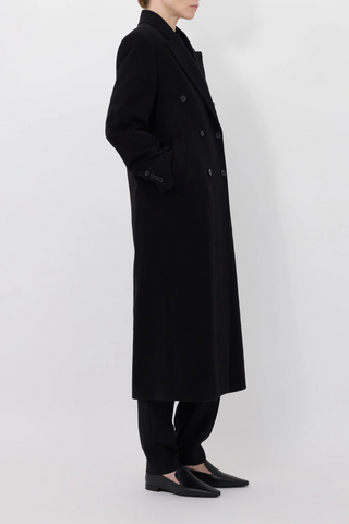 side profile model wearing Rosco Loro Piana Cashmere Blend Long black Coat double breasted