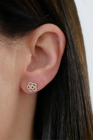model wearing Rose Stud Yellow Gold (Pair) yellow gold Diamond Rose Stud
.25 carats of pavé diamonds
Ornate rose shape
Set in 14k gold
Sold as a PAIR
Earring height: 10 mm | Earring width: 1 mm
Finished with butterfly backings