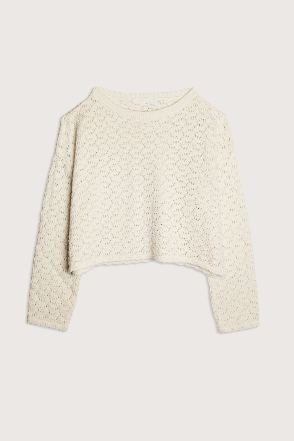 flat lay Rosie Crochet Cropped Boat Neck Top gardenia Boatneck
Cropped fit
Crochet throughout
Long sleeves
Cotton/Silk/Cashmere blend