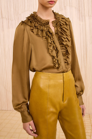 front profile model wearing Rouen Silk Ruffle Front Blouse Willow Gathered sleeves, Elegant volume, Richly layered ruffles