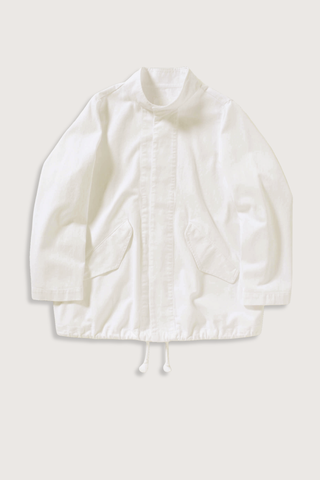 flat lay Ruth Cotton Twill Jacket Ivory Stand collar
Angled welt flap pockets
Interior drawcords at hem
Tonal button front closure
Unlined
Boxy fit