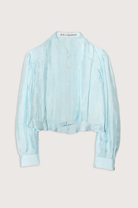 flat lay Ryland Morning Dew Silk Shirt light turquoise Victorian silhouette
Cropped shirt
Pleating details
button front
Ruffled hem
100% Silk