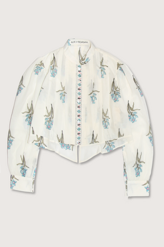 flat lay Ryland Sky Mist Flower Shirt off white cotton Cropped shirt
Pleating details
Structured yet delicate shape
Slightly sheer
Hand-block-printed with signature falling floral motif
Border-print placket
Block-printed by hand