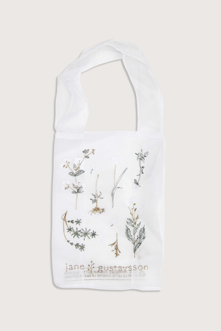 flat lay Sac tote bag Elle Blanc Crafted from delicate organza
Embroidered herbarium and floral motifs
Lightweight
Subtle transparency
