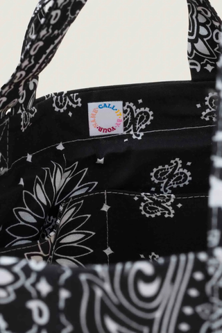close up inside logo Sac Picnic Tote All Black cotton bandana two outside pockets two side pockets with short and tall handles