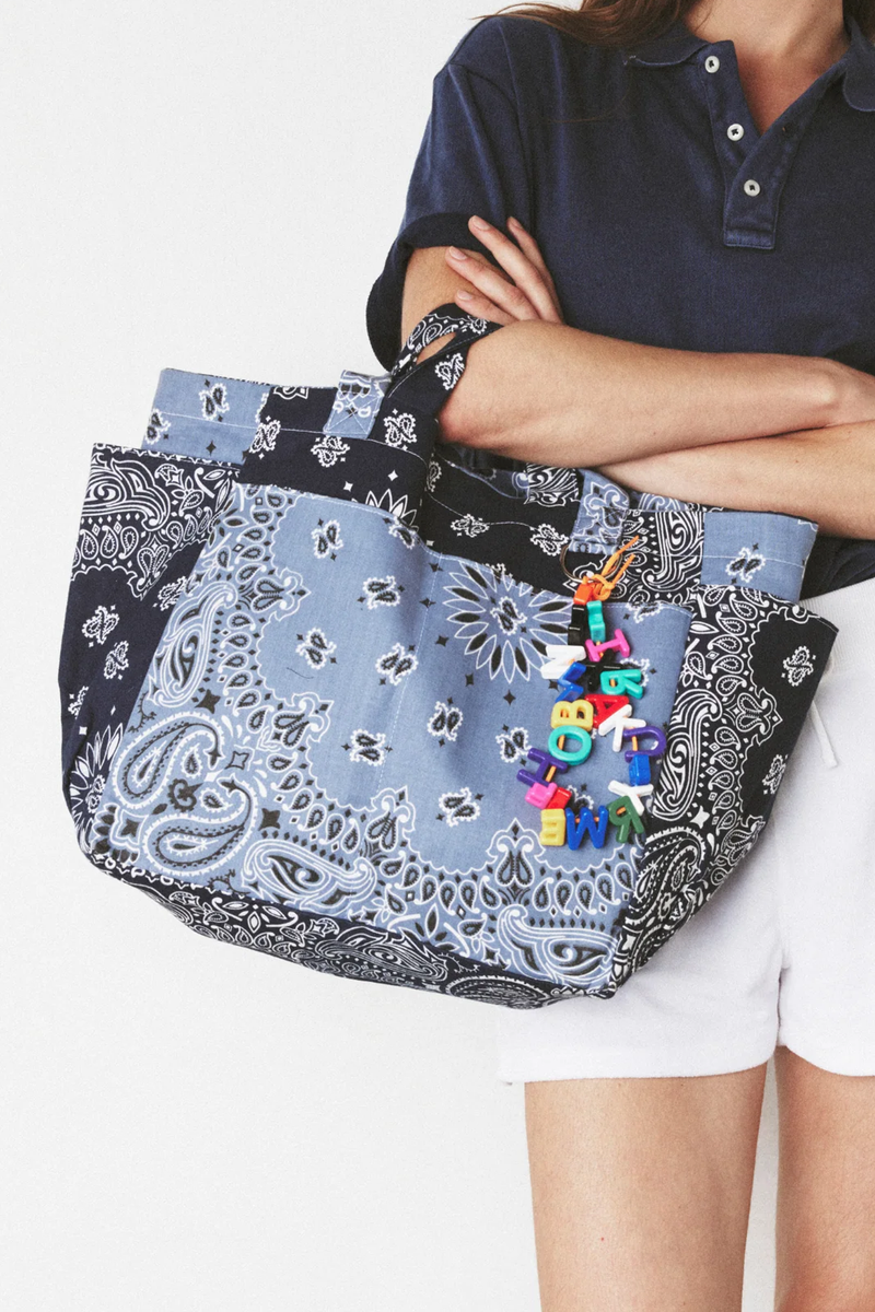 model wearing Sac Picnic Tote cotton bandana Chambray/Navy with long and short handles