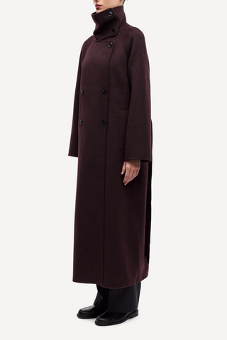 side profile model wearing Sahanne Wool Blend Coat black coffee brown oversized fit double breasted detachable waist tie