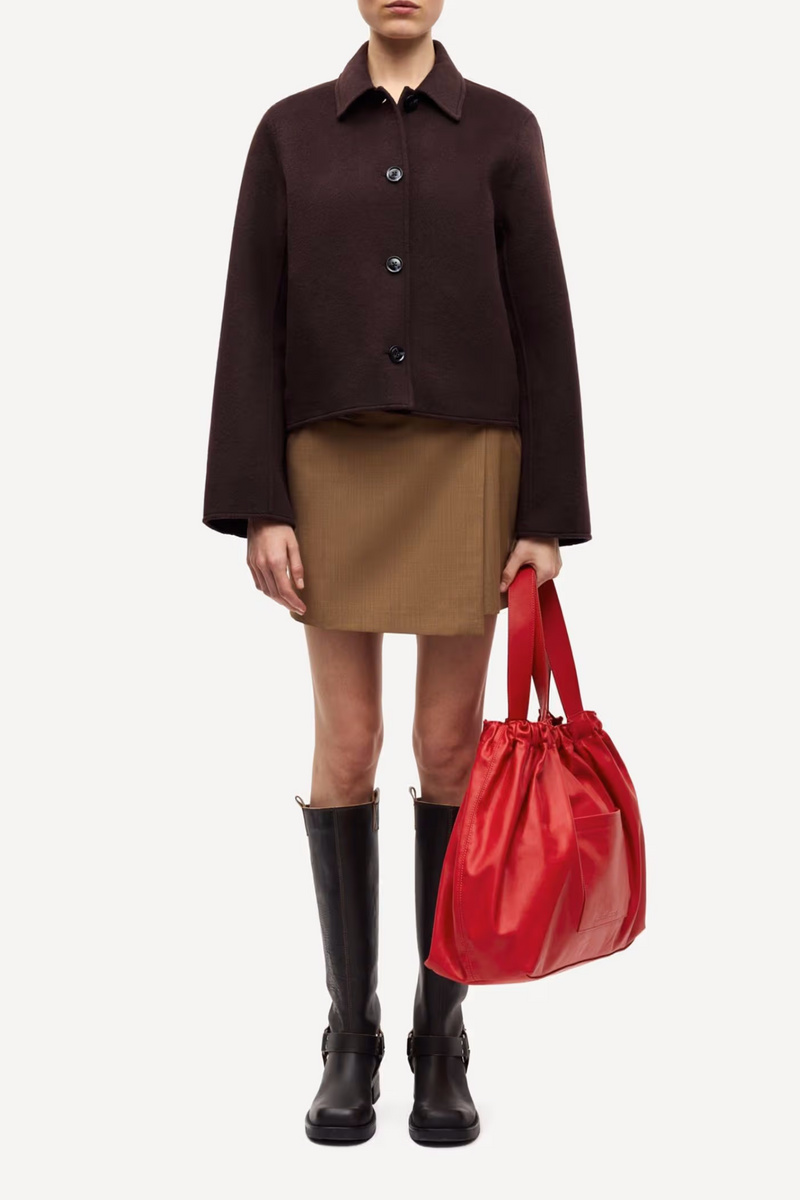 front profile model wearing Saholly Short Wool Blend Jacket black coffee brown Felted collared side slit pocket button closure