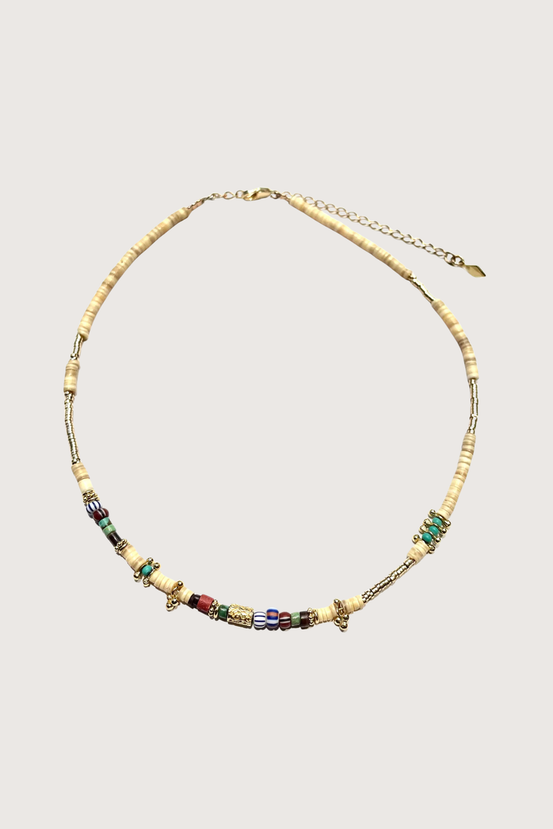 flat lay Sally Necklace ivory multi Strand of stones/shell and turquoises
Precious gold plated beads
3 microns
18K
vintage African trade beads
Dimensions: 16,53-17,5”~ 40-45cm long (adjustable)